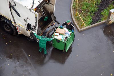 Junk Pickup Truck at a Residential Property